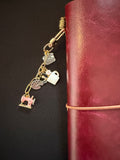 milesreadsalot X stayintouchraleigh journal charm