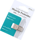 A silver metal Miniclip pen holder with a ribbed textured grip, attached to a white and teal paper backing card with Japanese text and the brand name Midori.