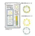 Packaged Hancoco slide mini sticker set with Japanese text, showing the carded product on the left and example stamped circular designs on the right.